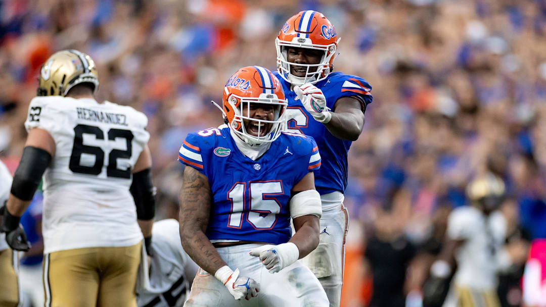 Florida Gators linebacker Derek Wingo (15) celebrates with Florida Gators linebacker Shemar James (6) after a quarterback sack during the second half against the Vanderbilt Commodores at Steve Spurrier Field at Ben Hill Griffin Stadium in Gainesville, FL on Saturday, October 7, 2023. [Matt Pendleton/Gainesville Sun]