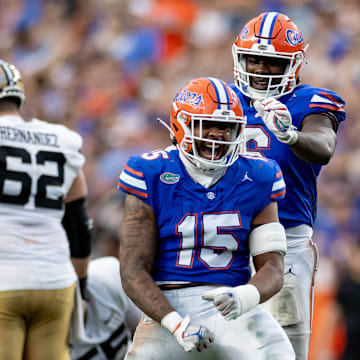 Florida Gators linebacker Derek Wingo (15) celebrates with Florida Gators linebacker Shemar James (6) after a quarterback sack during the second half against the Vanderbilt Commodores at Steve Spurrier Field at Ben Hill Griffin Stadium in Gainesville, FL on Saturday, October 7, 2023. [Matt Pendleton/Gainesville Sun]