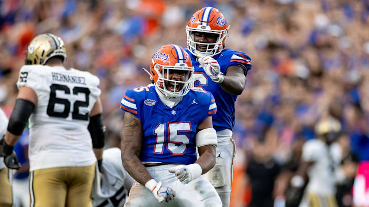 Florida Gators linebacker Derek Wingo (15) celebrates with Florida Gators linebacker Shemar James (6) after a quarterback sack during the second half against the Vanderbilt Commodores at Steve Spurrier Field at Ben Hill Griffin Stadium in Gainesville, FL on Saturday, October 7, 2023. [Matt Pendleton/Gainesville Sun]