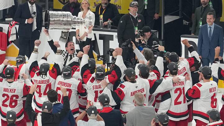 Jun 14, 2026; Las Vegas, Nevada, USA;  Carolina Hurricanes head coach Rod Brind'Amour celebrates holding the Stanley Cup after the win against the Vegas Golden Knights in game six of the 2026 Stanley Cup Final at T-Mobile Arena. Mandatory Credit: Lucas Peltier-Imagn Images