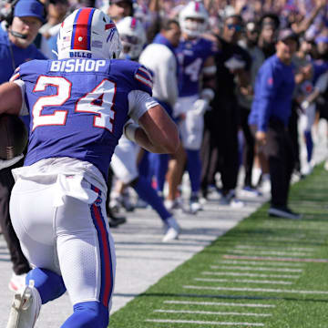 Buffalo Bills safety Cole Bishop, after intercepting the pass, starts to run towards the end zone, and gets tackled after gaining about 10 yards during first half action of the Bills home game against the New Orleans Saints in Orchard Park on Sept. 28, 2025.