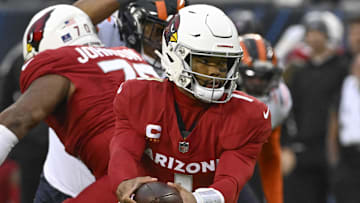 Dec 24, 2023; Chicago, Illinois, USA;  Arizona Cardinals quarterback Kyler Murray (1) looks to hand