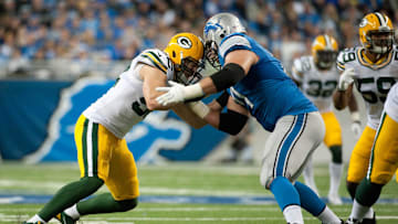 Nov 28, 2013; Detroit, MI, USA; Detroit Lions offensive tackle Riley Reiff (71) blocks Green Bay Packers outside linebacker Clay Matthews (52) during the second quarter during a NFL football game on Thanksgiving at Ford Field. Mandatory Credit: Tim Fuller-Imagn Images