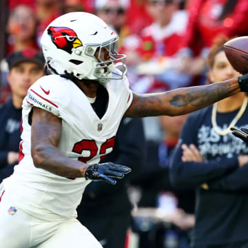 Dec 17, 2023; Glendale, Arizona, USA; Arizona Cardinals cornerback Antonio Hamilton Sr. (33) breaks up a pass intended for San Francisco 49ers wide receiver Brandon Aiyuk (11) during the first quarter at State Farm Stadium. Mandatory Credit: Mark J. Rebilas-USA TODAY Sports