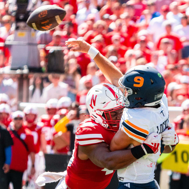 UTEP Miners quarterback Skyler Locklear (9) throws as he is hit by Nebraska Cornhuskers