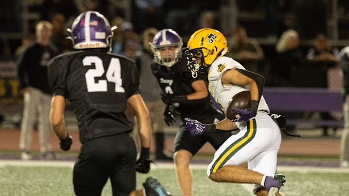 RBC Jason Berecsky gets a good run up the middle. Red Bank Catholic football defeats Rumson-Fair Haven in Rumson, NJ on October 10, 2025.