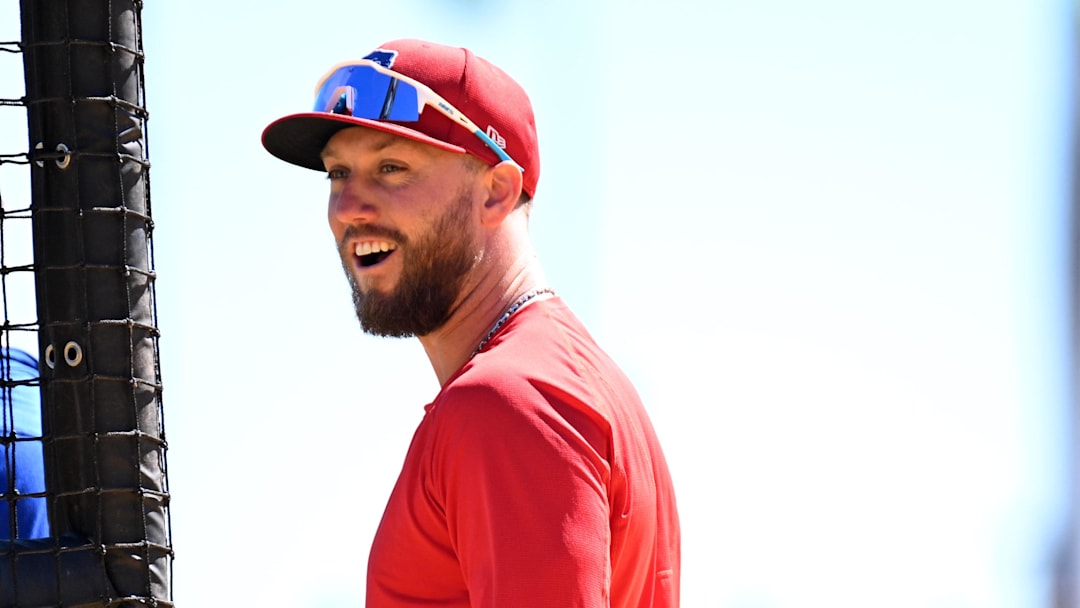 Mar 18, 2025; Bradenton, Florida, USA; Philadelphia Phillies first baseman Kody Clemens (2) warms up before the start of the game against the Pittsburgh Pirates during spring training at LECOM Park. Mandatory Credit: Jonathan Dyer-Imagn Images