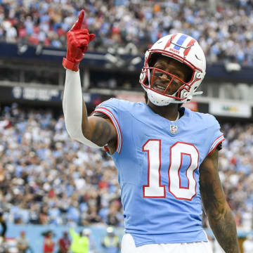 Oct 29, 2023; Nashville, Tennessee, USA;  Tennessee Titans wide receiver DeAndre Hopkins (10) celebrates his third touchdown of the game against the Atlanta Falcons during the second half at Nissan Stadium. Mandatory Credit: Steve Roberts-USA TODAY Sports