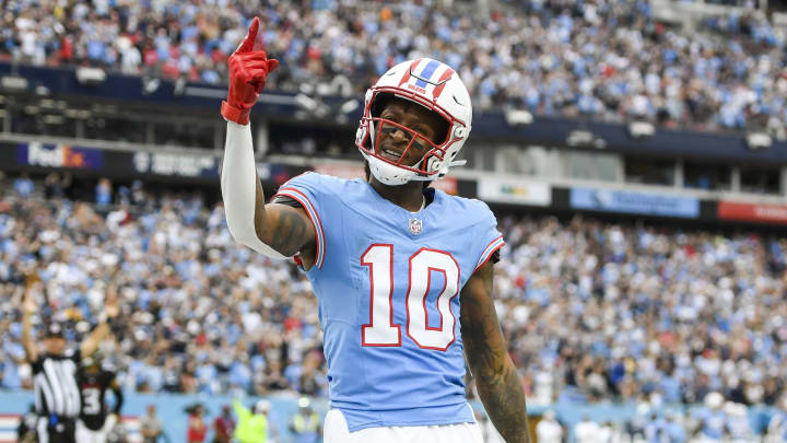 Oct 29, 2023; Nashville, Tennessee, USA;  Tennessee Titans wide receiver DeAndre Hopkins (10) celebrates his third touchdown of the game against the Atlanta Falcons during the second half at Nissan Stadium. Mandatory Credit: Steve Roberts-USA TODAY Sports