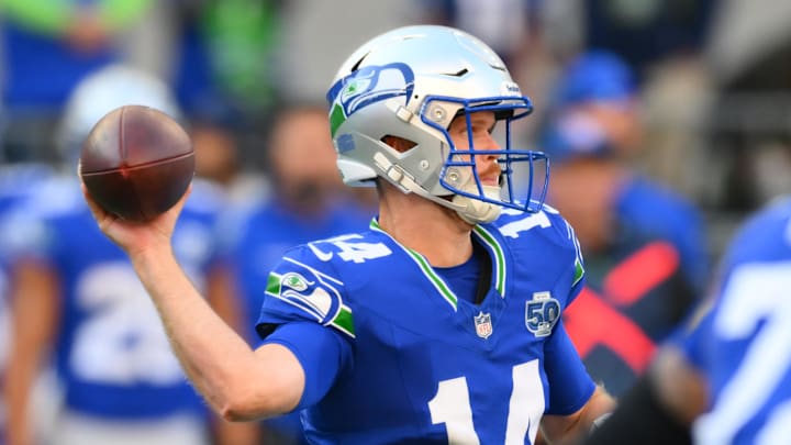 Oct 5, 2025; Seattle, Washington, USA; Seattle Seahawks quarterback Sam Darnold (14) throws downfield against the Tampa Bay Buccaneers during the second half at Lumen Field. Oct 5, 2025; Seattle, Washington, USA; Seattle Seahawks quarterback Sam Darnold (14) throws downfield against the Tampa Bay Buccaneers during the second half at Lumen Field.