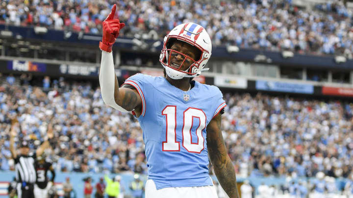 Oct 29, 2023; Nashville, Tennessee, USA;  Tennessee Titans wide receiver DeAndre Hopkins (10) celebrates his third touchdown of the game against the Atlanta Falcons during the second half at Nissan Stadium. Mandatory Credit: Steve Roberts-USA TODAY Sports