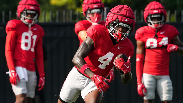 Aug 8, 2024; Columbus, Ohio, USA; Ohio State Buckeyes wide receiver Jeremiah Smith (4) catches a pass during football practice at the Woody Hayes Athletic Complex.