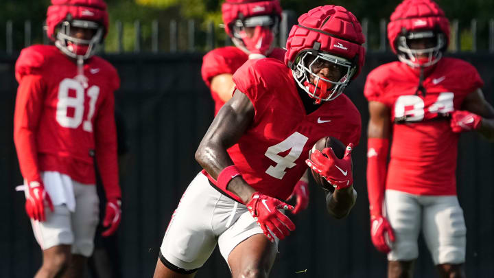 Aug 8, 2024; Columbus, Ohio, USA; Ohio State Buckeyes wide receiver Jeremiah Smith (4) catches a pass during football practice at the Woody Hayes Athletic Complex.