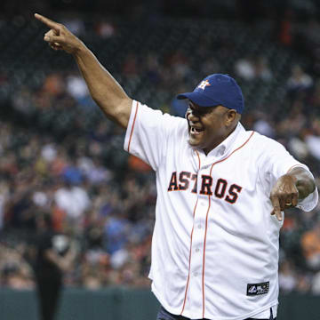 May 30, 2014; Houston, TX, USA; Former professional boxer George Foreman waves to the crowd after throwing out the first pitch of a game between the Houston Astros and the Baltimore Orioles at Minute Maid Park. 