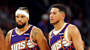Oct 22, 2025; Phoenix, Arizona, USA; Phoenix Suns guard Devin Booker (1) and forward Dillon Brooks (3) during the second half against the Sacramento Kings at the Mortgage Matchup Center. Mandatory Credit: Mark J. Rebilas-Imagn Images