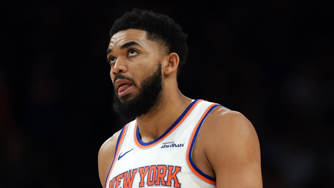 Jan 9, 2026; Phoenix, Arizona, USA; New York Knicks center Karl-Anthony Towns (32) reacts against the Phoenix Suns in the first half at Mortgage Matchup Center. Mandatory Credit: Mark J. Rebilas-Imagn Images