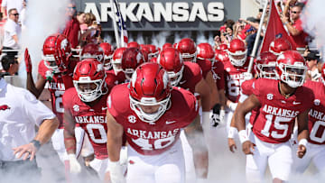 Sep 14, 2024; Fayetteville, Arkansas, USA; Arkansas Razorbacks team runs onto the field prior to the game against the UAB Blazers at Donald W. Reynolds Razorback Stadium. Mandatory Credit: Nelson Chenault-Imagn Images