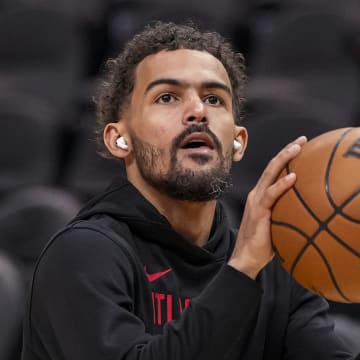 Apr 10, 2024; Atlanta, Georgia, USA; Atlanta Hawks guard Trae Young (11) shown while warming up on the court before the game Charlotte Hornets at State Farm Arena. Mandatory Credit: Dale Zanine-USA TODAY Sports