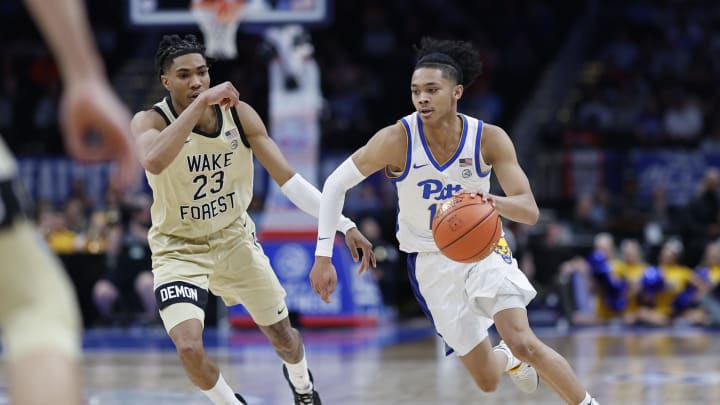 Mar 14, 2024; Washington, D.C., USA; Pittsburgh Panthers guard Jaland Lowe (15) drives to the basket as Wake Forest Demon Deacons guard Hunter Sallis (23) chases in the first half at Capital One Arena. Mandatory Credit: Geoff Burke-USA TODAY Sports