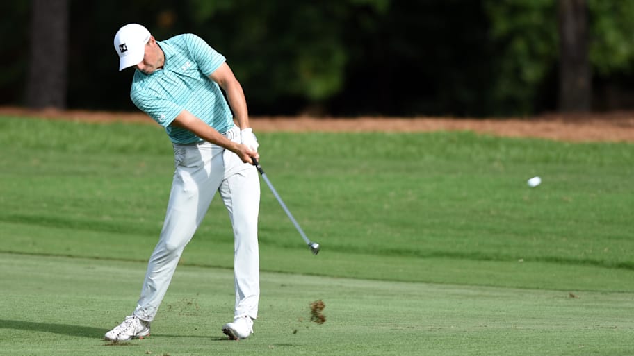 Jordan Speith hits his approach shot. | Rob Kinnan-Imagn Images