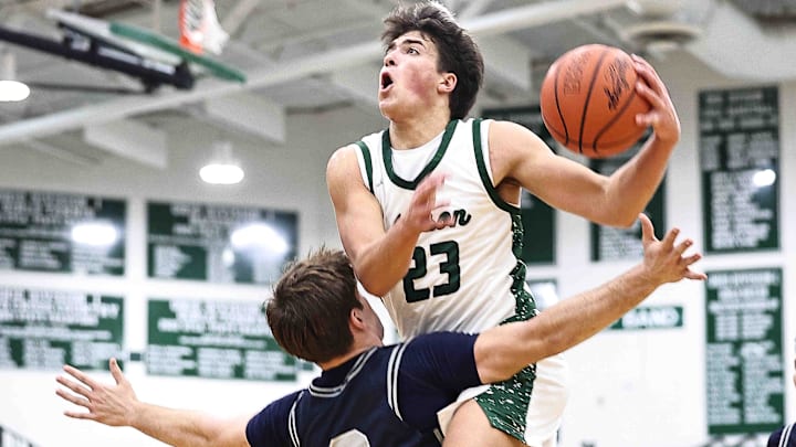 Mason's Jacob Lupinski (23) drives to the basket during the Comets' win over Kettering Fairmont at the Ohio Valley Hoops Classic Saturday, Nov. 29, 2025. Mason's Jacob Lupinski (23) drives to the basket during the Comets' win over Kettering Fairmont at the Ohio Valley Hoops Classic Saturday, Nov. 29, 2025.