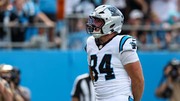 Oct 5, 2025; Charlotte, North Carolina, USA; Carolina Panthers tight end Mitchell Evans (84) reacts after scoring a touchdown during the fourth quarter against the Miami Dolphins at Bank of America Stadium. Mandatory Credit: Cory Knowlton-Imagn Images