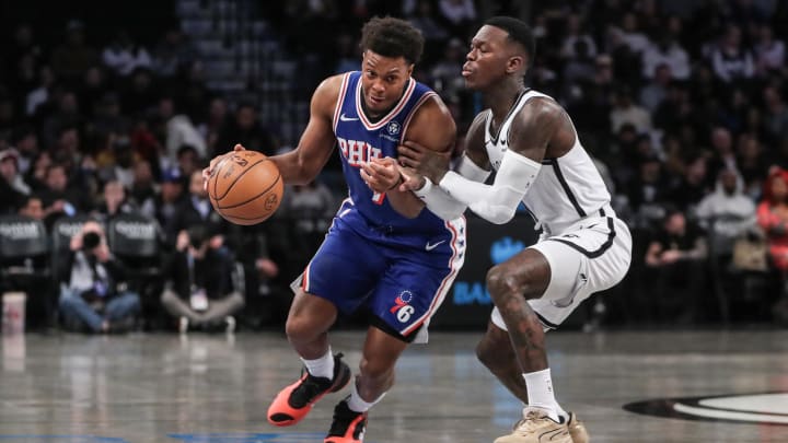 Mar 5, 2024; Brooklyn, New York, USA;  Philadelphia 76ers guard Kyle Lowry (7) looks to drive past Brooklyn Nets guard Dennis Schroder (17) in the first quarter at Barclays Center. Mandatory Credit: Wendell Cruz-USA TODAY Sports