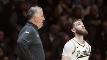 Purdue Boilermakers head coach Matt Painter talks to Purdue Boilermakers guard Braden Smith (3)