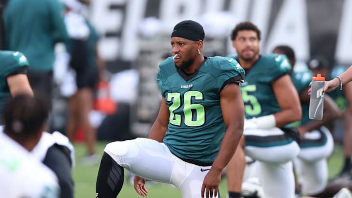 Aug 1, 2024; Philadelphia, PA, USA; Philadelphia Eagles running back Saquon Barkley (26) stretches during practice at Lincoln Financial Field. Mandatory Credit: Bill Streicher-Imagn Images