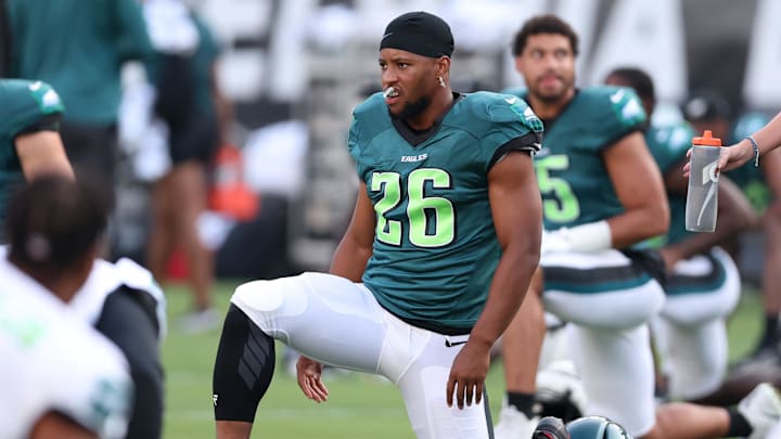 Aug 1, 2024; Philadelphia, PA, USA; Philadelphia Eagles running back Saquon Barkley (26) stretches during practice at Lincoln Financial Field. 