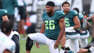 Aug 1, 2024; Philadelphia, PA, USA; Philadelphia Eagles running back Saquon Barkley (26) stretches during practice at Lincoln Financial Field. Mandatory Credit: Bill Streicher-USA TODAY Sports