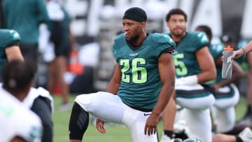 Aug 1, 2024; Philadelphia, PA, USA; Philadelphia Eagles running back Saquon Barkley (26) stretches during practice at Lincoln Financial Field. Mandatory Credit: Bill Streicher-USA TODAY Sports