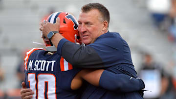 Aug 29, 2025; Champaign, Illinois, USA;  Illinois Fighting Illini head coach Bret Bielema and player defensive back Miles Scott (10) before an NCAA game against the Western Illinois Leathernecks at Memorial Stadium. Mandatory Credit: Ron Johnson-Imagn Images