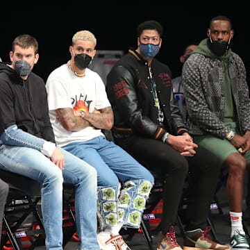 Apr 10, 2021; Brooklyn, New York, USA; Los Angeles Lakers small forward Jared Dudley (10) and center Marc Gasol (14) and small forward Kyle Kuzma (0) and power forward Anthony Davis (3) and small forward LeBron James (23) watch from the bench during the second quarter against the Brooklyn Nets at Barclays Center. Mandatory Credit: Brad Penner-Imagn Images