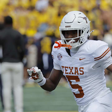 Sep 7, 2024; Ann Arbor, Michigan, USA;  Texas Longhorns wide receiver Ryan Wingo (5) warms up against the Michigan Wolverines at Michigan Stadium. Mandatory Credit: Rick Osentoski-Imagn Images