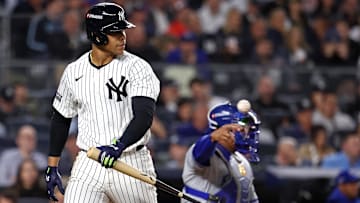 Oct 7, 2024; Bronx, New York, USA; New York Yankees outfielder Juan Soto (22) reacts after striking out against the Kansas City Royals in the third inning during game two of the ALDS for the 2024 MLB Playoffs at Yankee Stadium. Mandatory Credit: Vincent Carchietta-Imagn Images