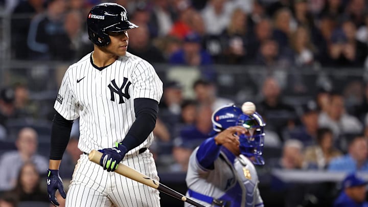 Oct 7, 2024; Bronx, New York, USA; New York Yankees outfielder Juan Soto (22) reacts after striking out against the Kansas City Royals in the third inning during game two of the ALDS for the 2024 MLB Playoffs at Yankee Stadium. Mandatory Credit: Vincent Carchietta-Imagn Images