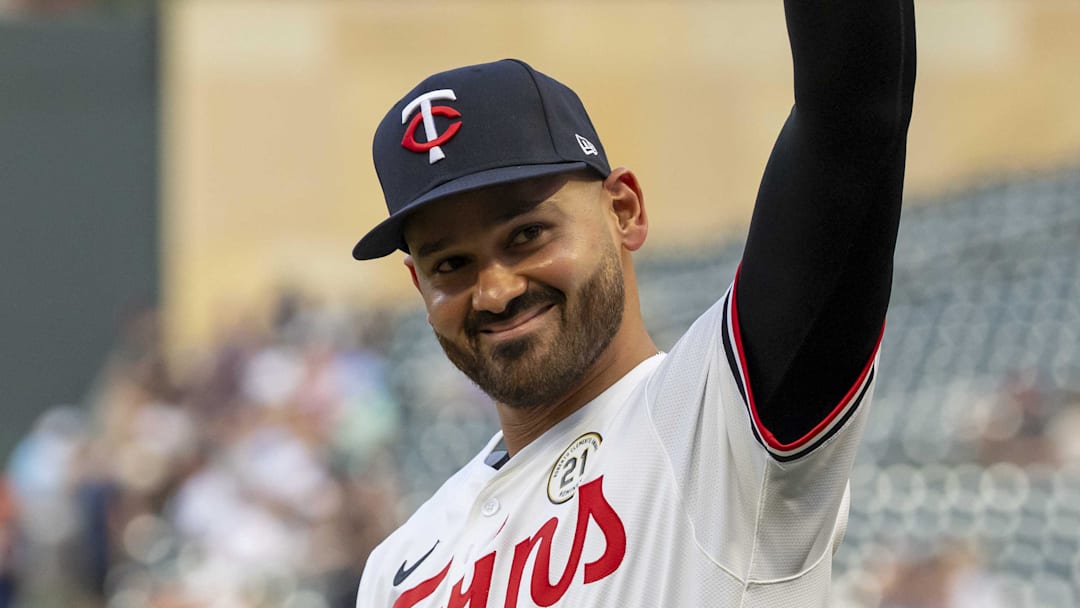 Sep 15, 2025; Minneapolis, Minnesota, USA; Minnesota Twins starting pitcher Pablo Lopez (49) waves to the crowd as he is introduced for being a Roberto Clemente award nominee before a game against the New York Yankees at Target Field. Mandatory Credit: Jesse Johnson-Imagn Images