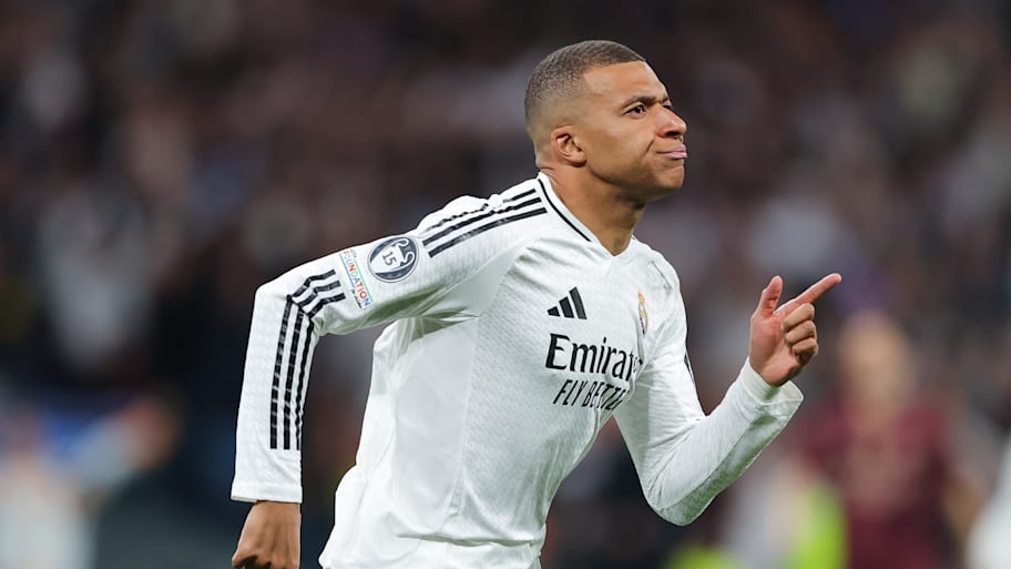 Kylian Mbappé celebrating.