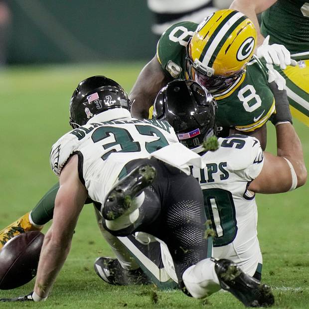 Green Bay Packers running back Josh Jacobs is stuffed on the pivotal fourth down against the Eagles.