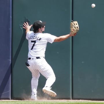 Jul 31, 2024; Chicago, Illinois, USA; Chicago White Sox outfielder Dominic Fletcher cannot catch a ball.