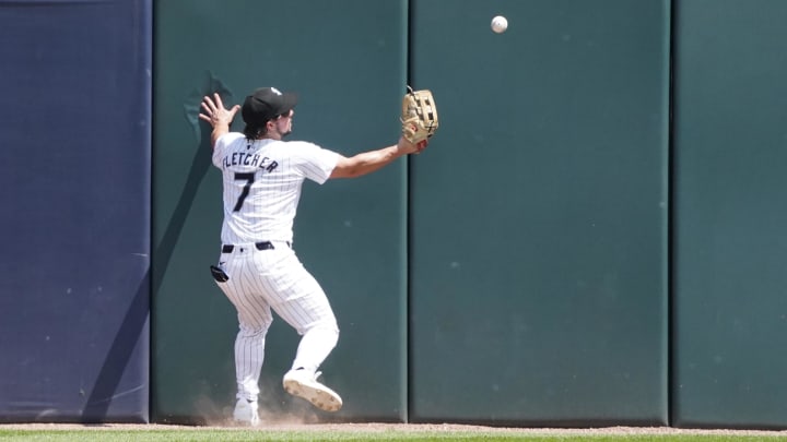 Jul 31, 2024; Chicago, Illinois, USA; Chicago White Sox outfielder Dominic Fletcher cannot catch a ball.