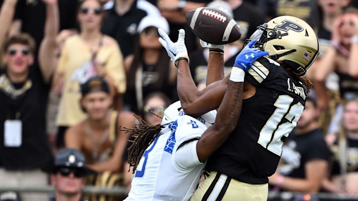 Purdue Boilermakers wide receiver Leland Smith (12) catches a ball for a touchdown 