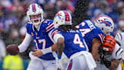 Buffalo Bills quarterback Josh Allen (17) hands off to running back James Cook III (4) in the second quarter of the NFL Week 14 game between the Buffalo Bills and the Cincinnati Bengals at Highmark Stadium in Orchard Park, N.Y., on Sunday, Dec. 7, 2025.