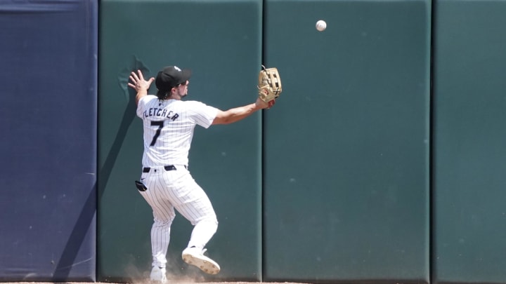 Jul 31, 2024; Chicago, Illinois, USA; Chicago White Sox outfielder Dominic Fletcher (7) cannot catch a ball hit for a double hit by Kansas City Royals catcher Salvador Perez (not pictured) during the fifth inning at Guaranteed Rate Field. Mandatory Credit: David Banks-USA TODAY Sports