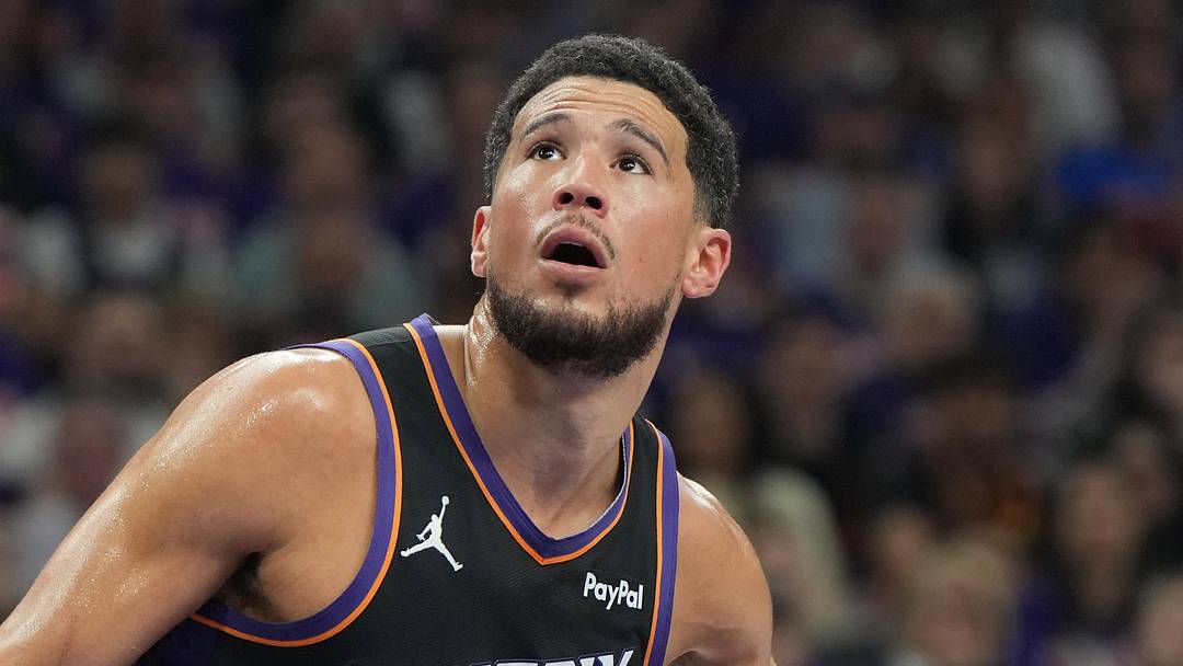 Apr 25, 2026; Phoenix, Arizona, USA; Phoenix Suns guard Devin Booker (1) blocks out against the Oklahoma City Thunder in the first half during game three of the first round of the 2026 NBA Playoffs at Mortgage Matchup Center. Mandatory Credit: Rick Scuteri-Imagn Images