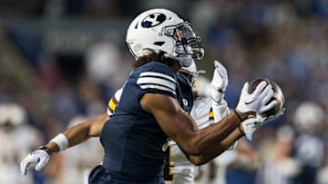 Keanu Hill hauls in a long bomb against Wyoming.
