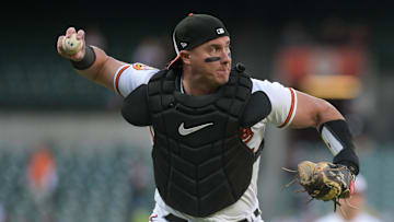 Baltimore Orioles catcher James McCann (27) throws 