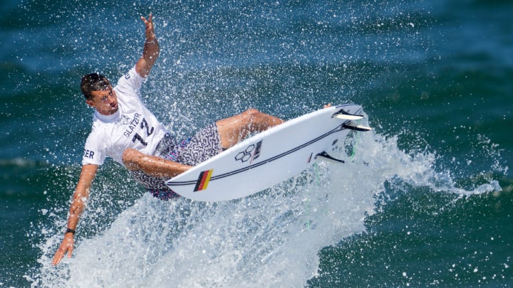 Germany's Leon Glatzer surfs in men's round two competition during the Tokyo Olympics.