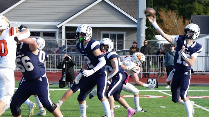Marist Catholic senior quarterback Nick Hudson threw for 306 yards and four touchdowns in Spartans' semifinal win against Scappoose.